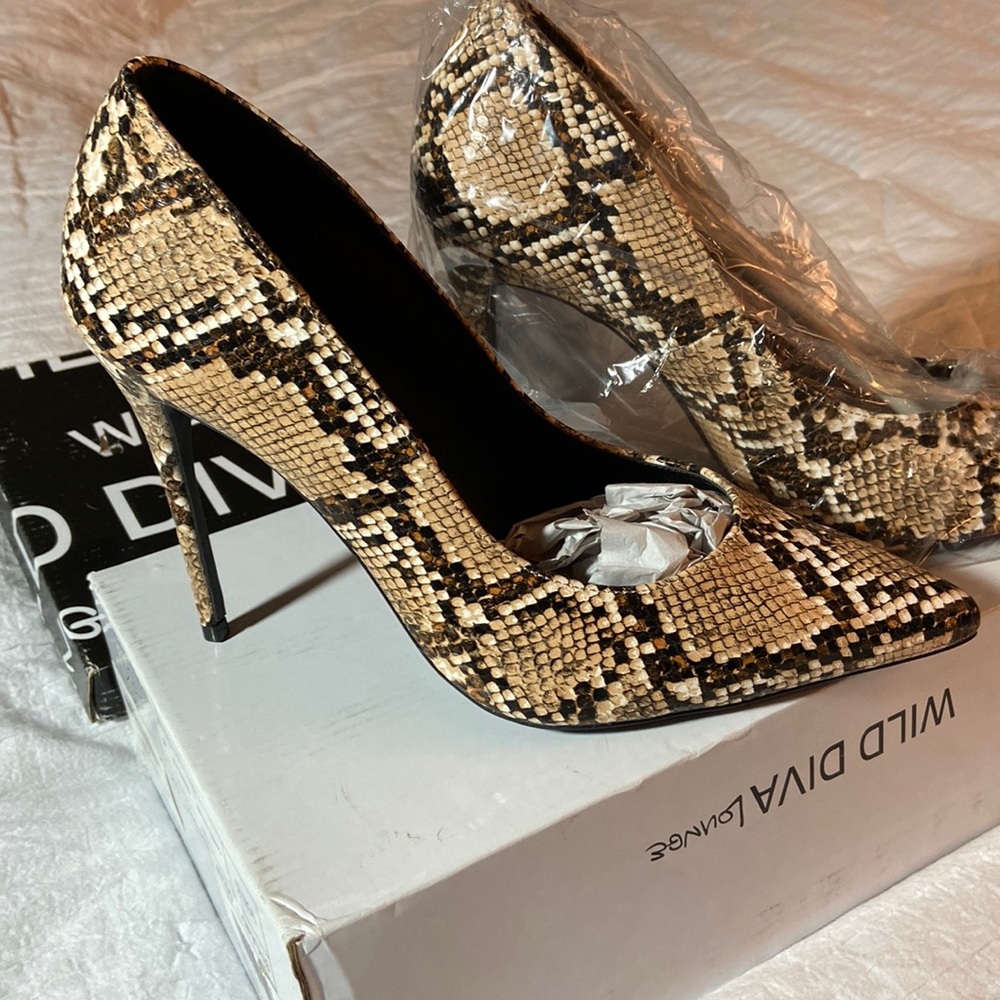 These heels are hot! New inbox snake print high heels.